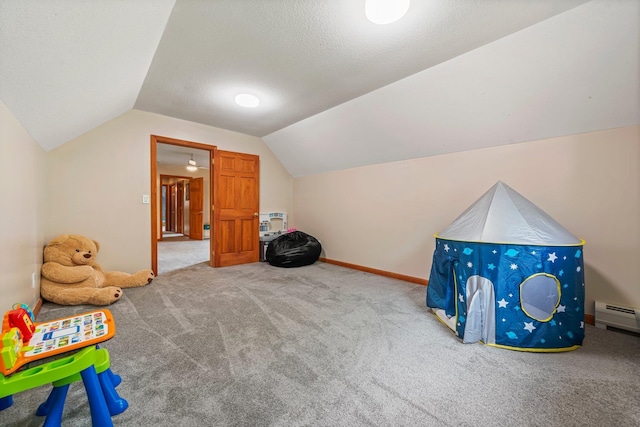 290 Cornish Tpke, Newport, NH 03773 - game room with carpet flooring, vaulted ceiling, a baseboard heating unit, a textured ceiling, and baseboards
