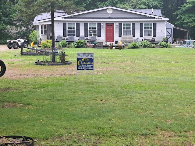 3 Osullivan Way, Ossipee, NH 03814 - view of front of property with a front lawn