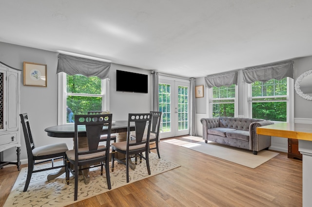 414 Blueberry Ln, Conway, NH 03860 - dining area featuring wood finished floors and french doors