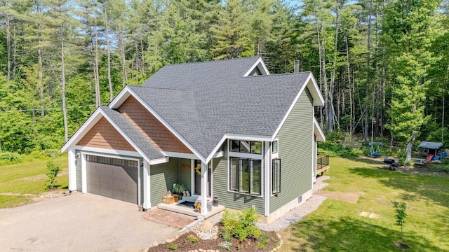 20 Horse Pasture Ln, Thornton, NH 03285 - view of front of property featuring an attached garage, driveway, a front yard, and roof with shingles