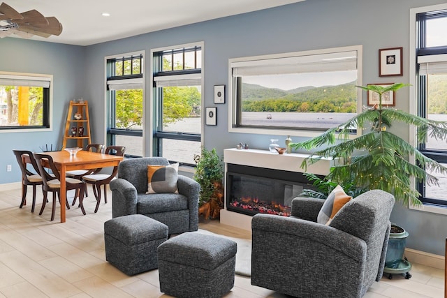 111 Nh Route 4a, Enfield, NH 03748 - living area with a ceiling fan, recessed lighting, and baseboards