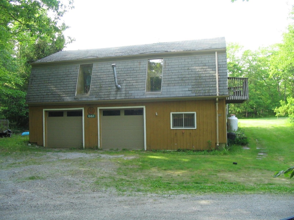 661AND663 Hancock Rd, Harrisville, NH 03450 - view of home's exterior with driveway and a detached garage