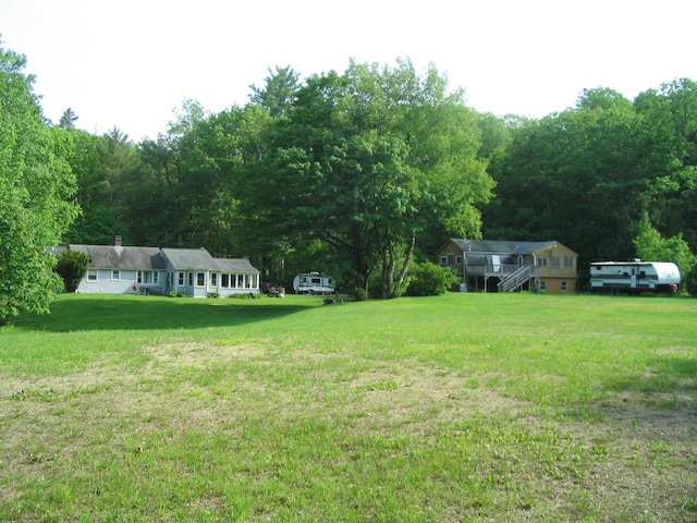 661AND663 Hancock Rd, Harrisville, NH 03450 - view of green lawn featuring a wooded view