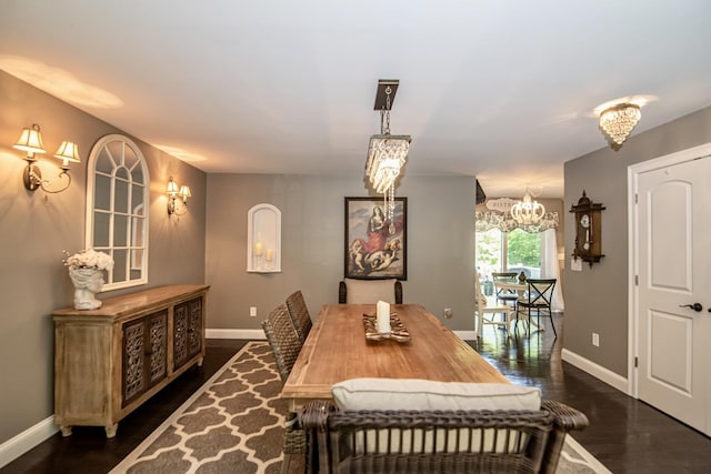 4 Crossman Cir, Newton, NH 03858 - dining room with a chandelier, baseboards, and dark wood finished floors