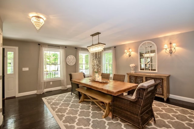 4 Crossman Cir, Newton, NH 03858 - dining area with dark wood-style floors and baseboards