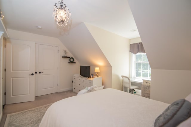 4 Crossman Cir, Newton, NH 03858 - bedroom with vaulted ceiling, light colored carpet, a chandelier, and a closet