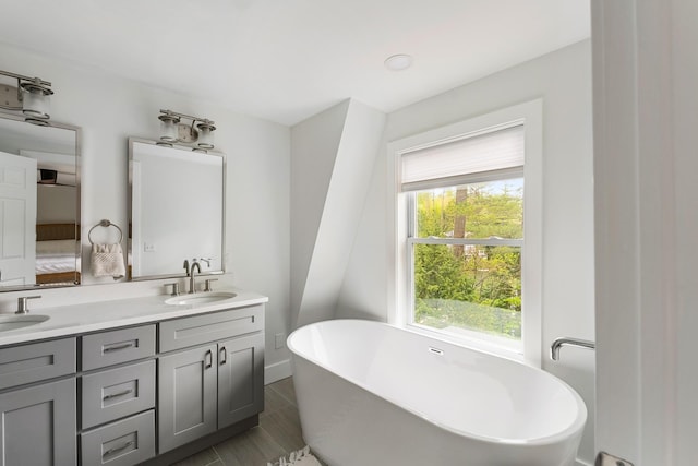 6 Paquette Ln, Sunapee, NH 03782 - full bathroom featuring double vanity and a freestanding bath