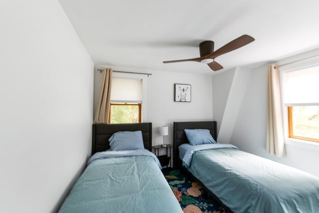 6 Paquette Ln, Sunapee, NH 03782 - bedroom featuring multiple windows and a ceiling fan