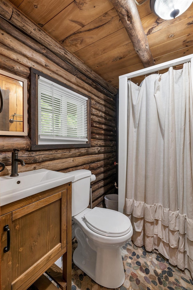 230 Pine Hill Rd, Ossipee, NH 03864 - full bathroom featuring wooden ceiling, vanity, toilet, rustic walls, and a shower with curtain