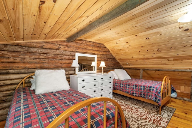 230 Pine Hill Rd, Ossipee, NH 03864 - bedroom featuring rustic walls, lofted ceiling, wooden ceiling, and wood finished floors