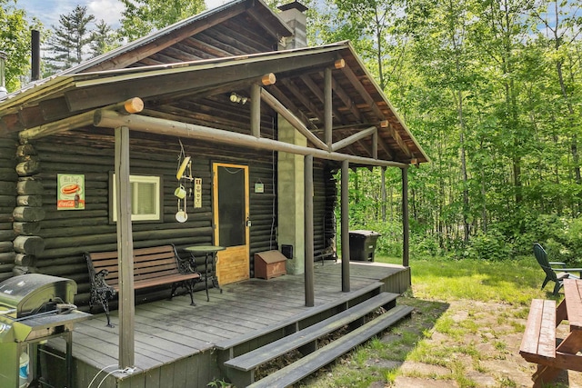 230 Pine Hill Rd, Ossipee, NH 03864 - wooden terrace with a grill