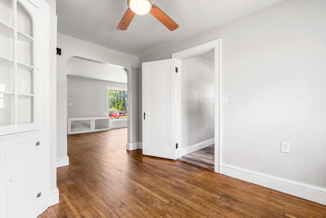 33 Hayes Ave, Manchester, NH 03103 - spare room with arched walkways, a ceiling fan, hardwood / wood-style floors, and baseboards