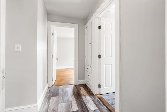 33 Hayes Ave, Manchester, NH 03103 - corridor featuring wood finished floors and baseboards