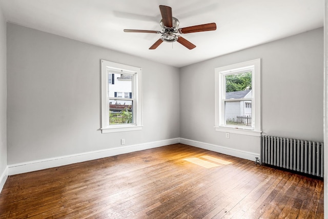 33 Hayes Ave, Manchester, NH 03103 - unfurnished room featuring radiator, wood-type flooring, baseboards, and a ceiling fan