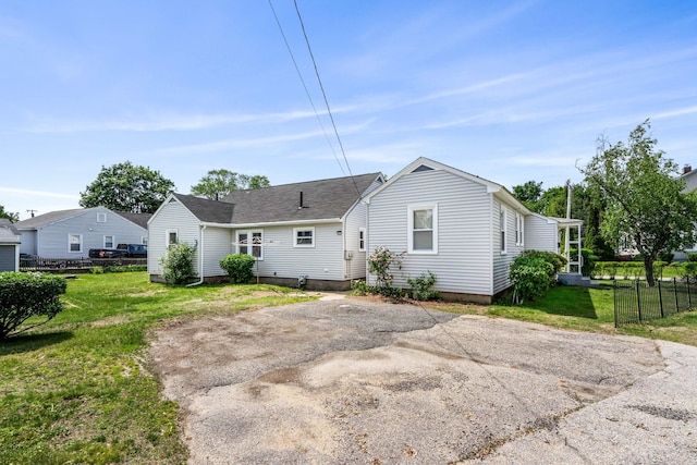 33 Hayes Ave, Manchester, NH 03103 - back of property featuring roof with shingles