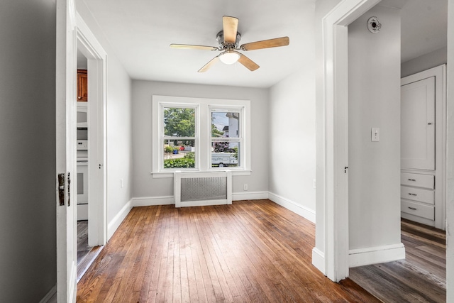 33 Hayes Ave, Manchester, NH 03103 - unfurnished room featuring hardwood / wood-style floors, radiator heating unit, baseboards, and ceiling fan