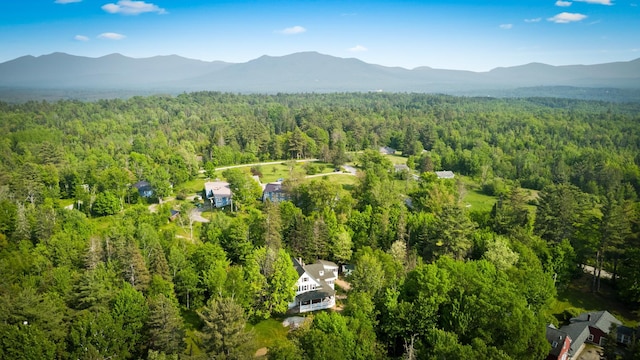 183 Mountain View Rd, Whitefield, NH 03598 - aerial view of a forest and mountains