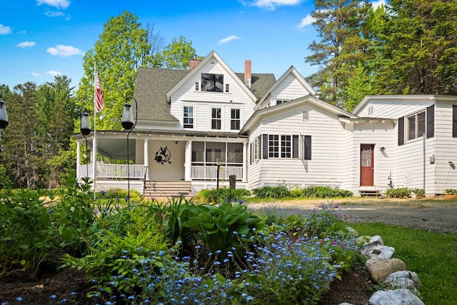 183 Mountain View Rd, Whitefield, NH 03598 - view of front of house with a chimney, roof with shingles, and entry steps