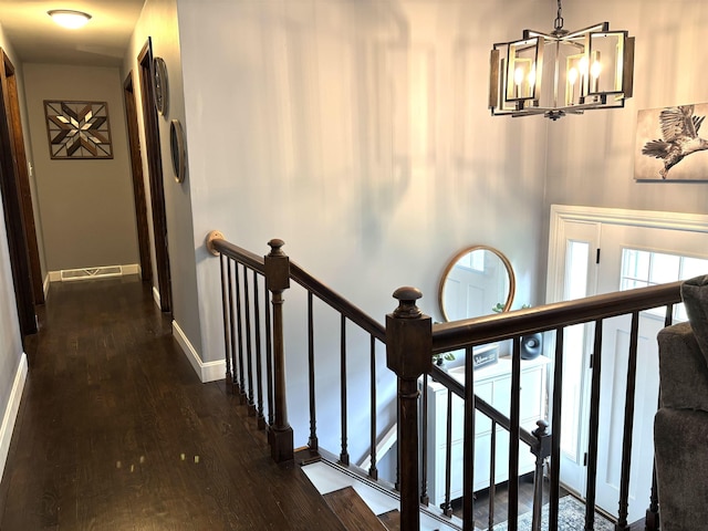 4 Mount Vernon Dr, Pelham, NH 03076 - corridor with an upstairs landing, a chandelier, wood finished floors, and baseboards