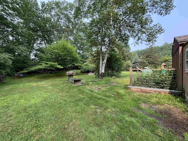 4 Mount Vernon Dr, Pelham, NH 03076 - view of green lawn with a garden