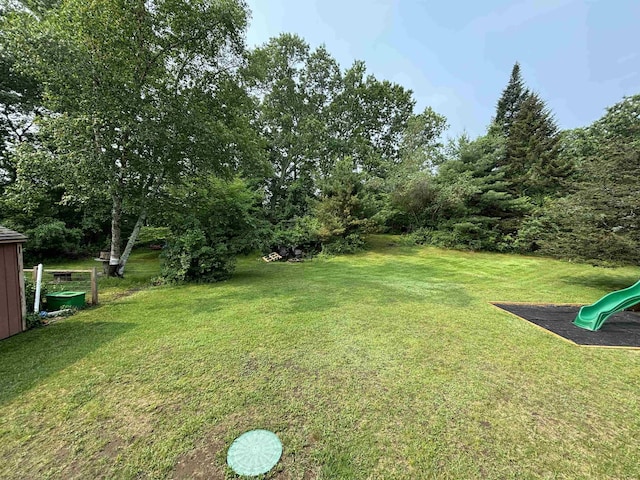 4 Mount Vernon Dr, Pelham, NH 03076 - view of green lawn featuring a playground