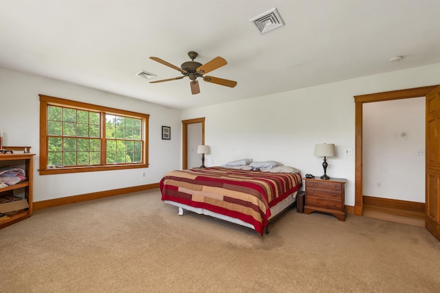 190 Ledge Hill Rd, Tuftonboro, NH 03816 - bedroom featuring light colored carpet, baseboards, and a ceiling fan
