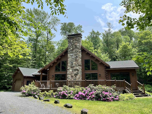 27 Stearns Ave, Wilmington, VT 05363 - rear view of property with log exterior, a deck, a chimney, and an outdoor structure