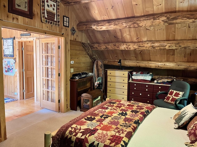 27 Stearns Ave, Wilmington, VT 05363 - carpeted bedroom with wood walls and wood ceiling