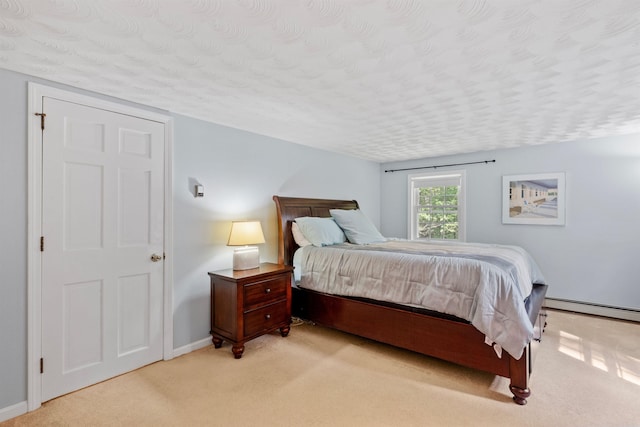 6 Bona Vista Dr, Bow, NH 03304 - bedroom featuring carpet floors, baseboards, a textured ceiling, and a baseboard heating unit