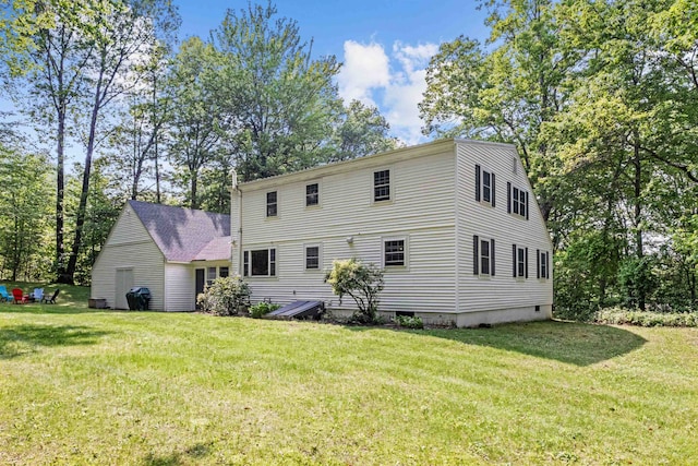 6 Bona Vista Dr, Bow, NH 03304 - back of property with a lawn
