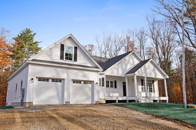 70 Hatch Corner Rd, Meredith, NH 03253 - view of front of property with a porch, a garage, and driveway