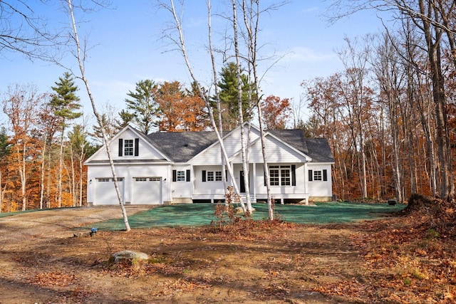 70 Hatch Corner Rd, Meredith, NH 03253 - rear view of house featuring driveway, a yard, and a garage