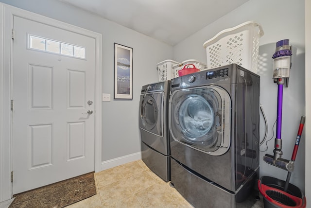 109 Temple Rd, Wilton, NH 03086 - laundry room featuring washer and dryer, tile patterned flooring, and baseboards