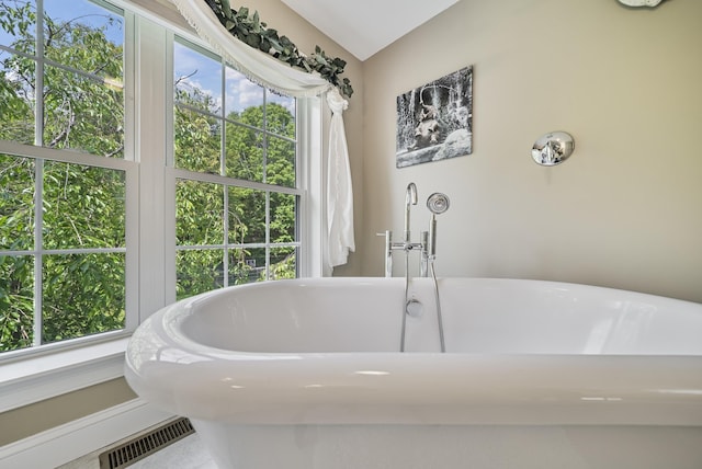 109 Temple Rd, Wilton, NH 03086 - bathroom featuring a freestanding bath and healthy amount of natural light
