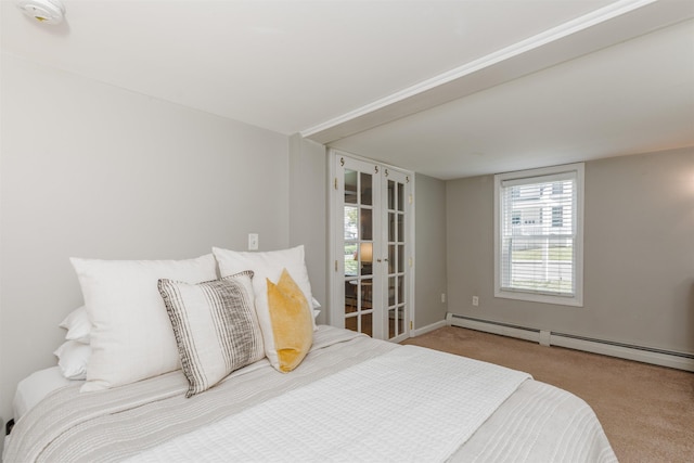 191 Washington St Unit 1, Dover, NH 03820 - bedroom featuring carpet flooring, a baseboard heating unit, and baseboards