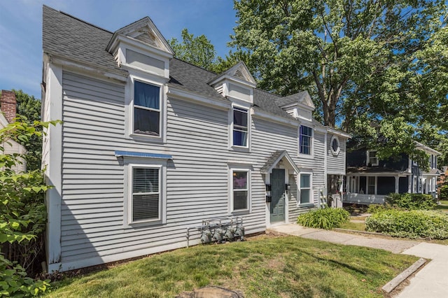 191 Washington St Unit 1, Dover, NH 03820 - view of front of home with a front yard and roof with shingles