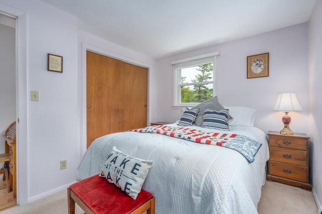 42 Bennett Bridge Rd, Northwood, NH 03261 - bedroom featuring light colored carpet, baseboards, and a closet