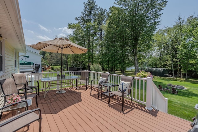 42 Bennett Bridge Rd, Northwood, NH 03261 - wooden deck with a lawn and outdoor dining area