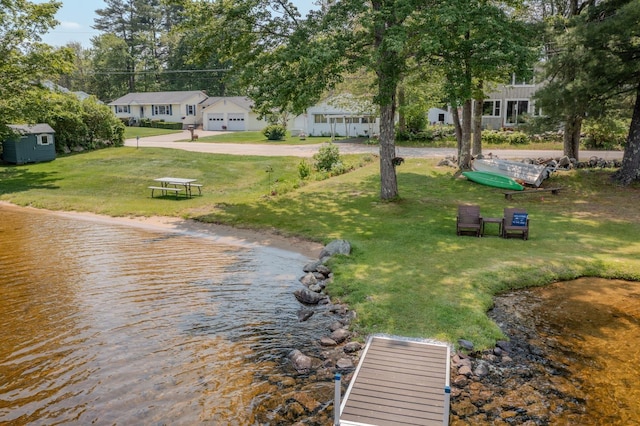 42 Bennett Bridge Rd, Northwood, NH 03261 - dock area with a lawn and a residential view