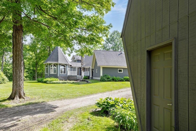 98 Sugar Maple Dr, Swanton, VT 05488 - view of front facade with dirt driveway and a front yard
