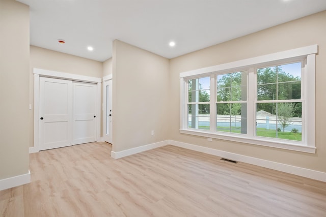 288 Sterling Dr, Laconia, NH 03249 - unfurnished room with baseboards, light wood finished floors, and recessed lighting
