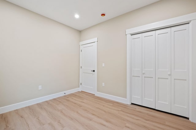 288 Sterling Dr, Laconia, NH 03249 - unfurnished bedroom with light wood finished floors, baseboards, recessed lighting, and a closet