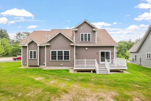 288 Sterling Dr, Laconia, NH 03249 - back of property with a lawn, a deck, and roof with shingles