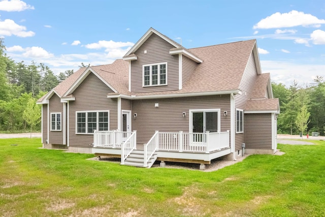 288 Sterling Dr, Laconia, NH 03249 - rear view of property featuring a wooden deck, a shingled roof, and a lawn
