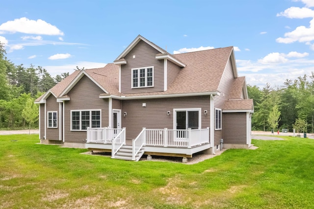 288 Sterling Dr, Laconia, NH 03249 - rear view of property with a wooden deck, a lawn, and roof with shingles