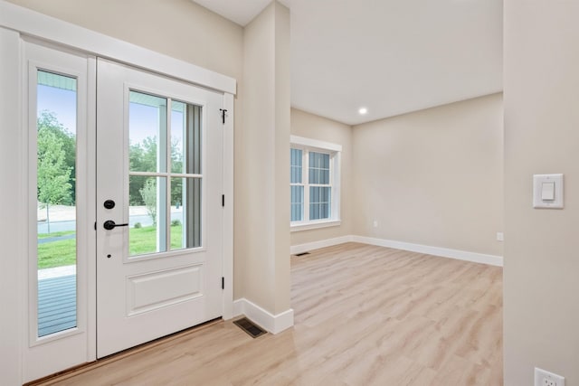 288 Sterling Dr, Laconia, NH 03249 - entrance foyer with baseboards and light wood-style floors