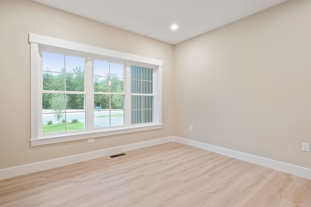 288 Sterling Dr, Laconia, NH 03249 - unfurnished room with baseboards, light wood-style floors, and recessed lighting