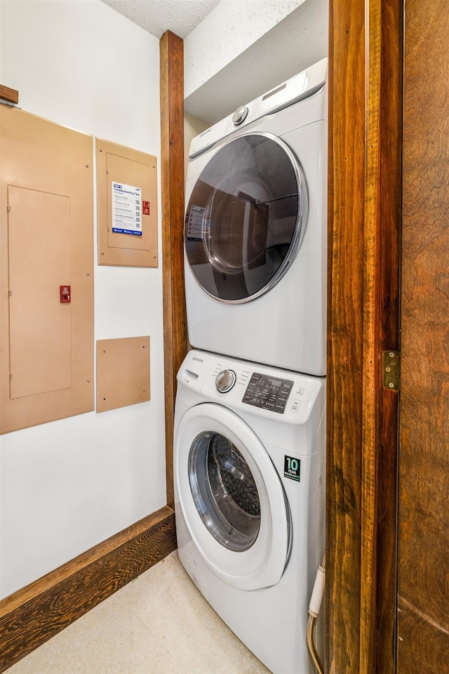 210 Field Rd Unit 44, Stowe, VT 05672 - laundry area with stacked washer / dryer and electric panel