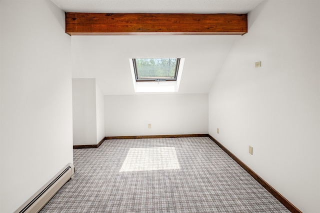 210 Field Rd Unit 44, Stowe, VT 05672 - additional living space featuring a baseboard heating unit, a skylight, carpet flooring, and baseboards