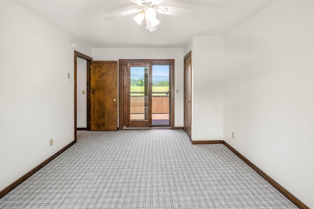210 Field Rd Unit 44, Stowe, VT 05672 - carpeted empty room with baseboards and a ceiling fan